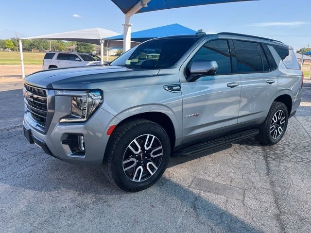 2024 GMC Yukon AT4 in Sterling Metallic — front three-quarter view