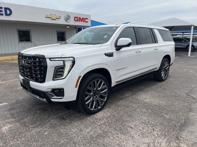 2025 GMC Yukon XL Denali Ultimate in White Frost Tricoat — front three-quarter view
