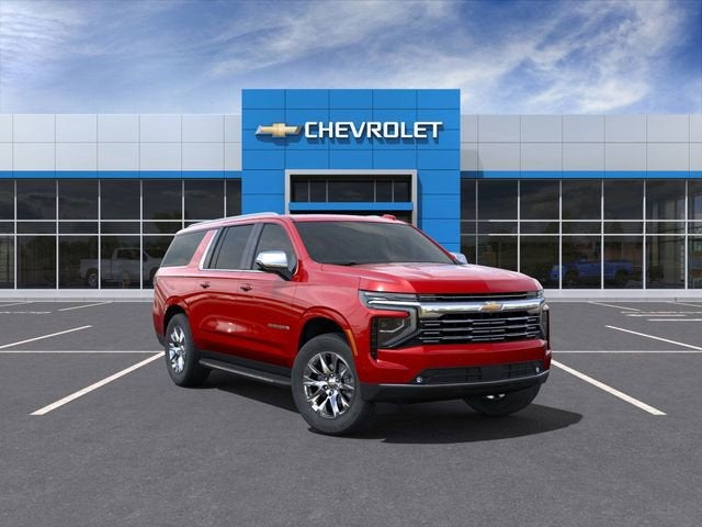 2025 Chevrolet Suburban Premier in Radiant Red Tintcoat — front three-quarter view