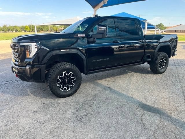 2024 GMC Sierra 2500 HD AT4X in Onyx Black — front three-quarter view