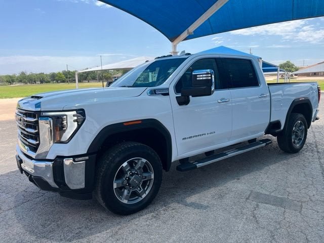 2026 GMC Sierra 2500 HD SLT in Summit White — front three-quarter view