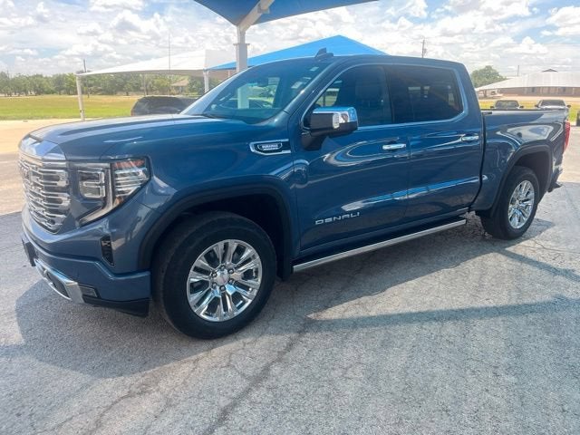 2025 GMC Sierra 1500 Denali in Downpour Metallic — front three-quarter view