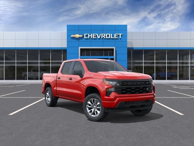 2025 Chevrolet Silverado 1500 Custom in Red Hot — front three-quarter view