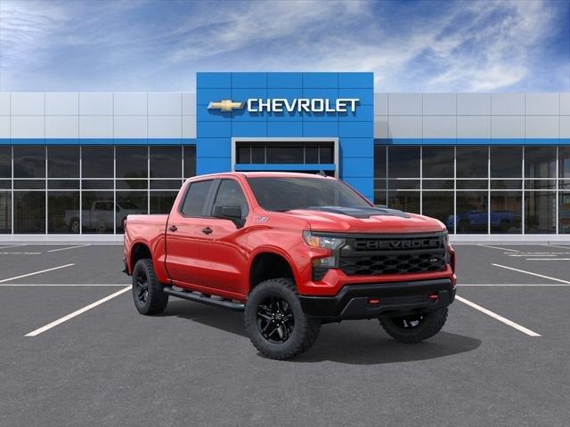 2026 Chevrolet Silverado 1500 Custom Trail Boss in Red Hot — front three-quarter view