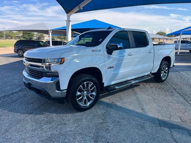 2021 Chevrolet Silverado 1500 LT in Summit White — front three-quarter view