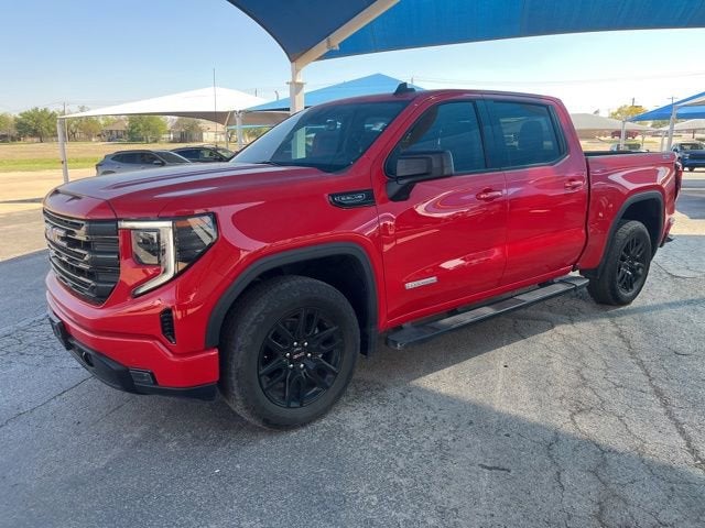 2024 GMC Sierra 1500 Elevation in Cardinal Red — front three-quarter view