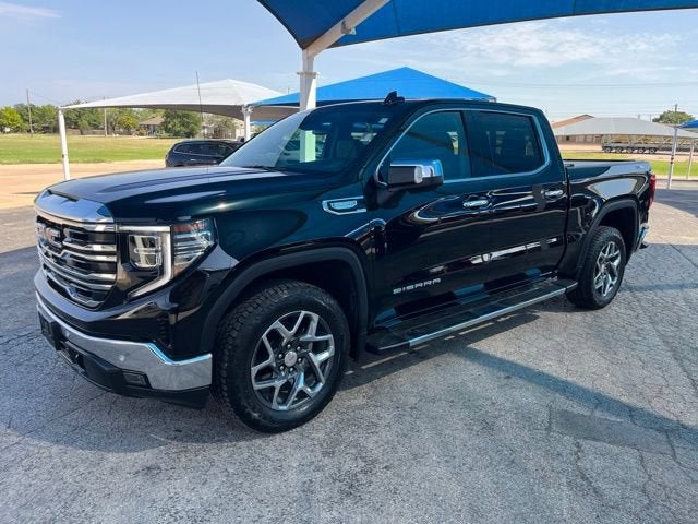 2024 GMC Sierra 1500 SLT in Onyx Black — front three-quarter view