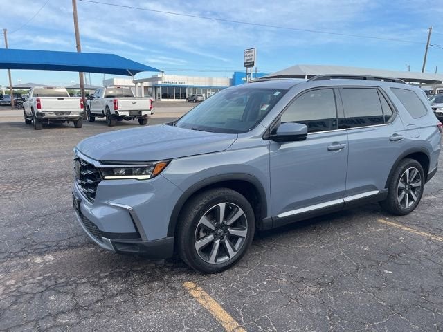 2024 Honda Pilot Touring in Gray — front three-quarter view